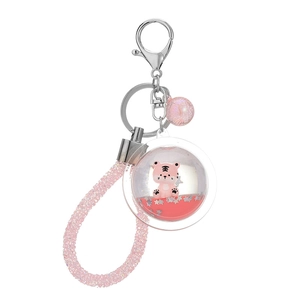 Pink tiger liquid quicksand keychain with star sequins and beaded wrist strap charm