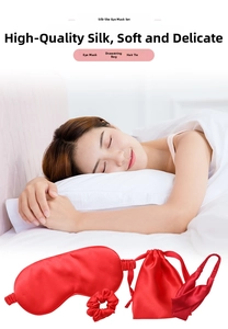 Three-piece red faux silk sleep set featuring a padded eye mask, scrunchie, and storage bag