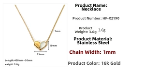 Detail view of heart pendant with shell inlay and 18k gold plated stainless steel chain