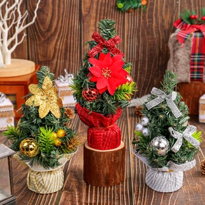 Mini Christmas trees in red, gold, and silver colors for tabletop festive decoration