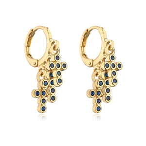 Detail of 18K gold plated hoop earrings featuring clustered blue zircon stone pendants
