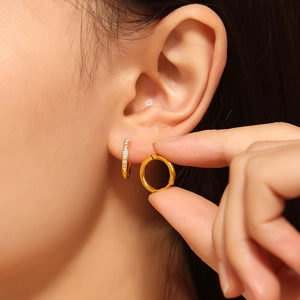 Gold PVD coated stainless steel hoop earrings with cubic zirconia pavé detailing