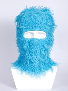 Close-up of sky blue knitted balaclava mask featuring fluffy faux feather plush texture