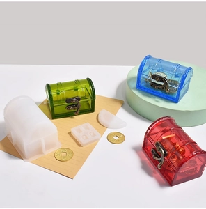 Macro detail of treasure chest resin mold with colorful finished boxes and metal buckles