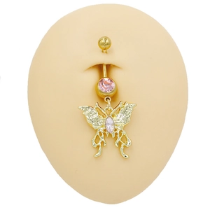 Detail of golden butterfly belly ring with pink gems worn on a model against white background