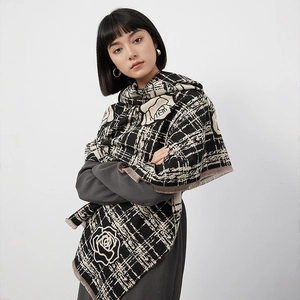 Elegant women's camellia floral scarf with black and white grid patterns and fringe detail