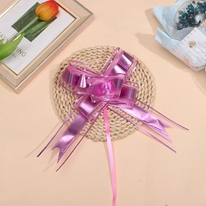 Large matte purple metallic tulle pull bow for Christmas gift wrapping and wedding decor