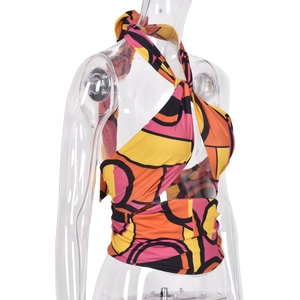 Side view of halter crop top featuring colorful geometric ring patterns on a female bust