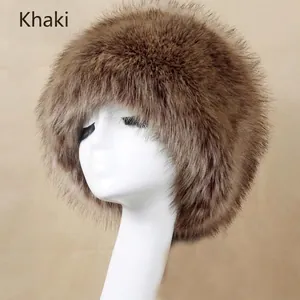 Detail of khaki brown faux fur hat featuring thick plush texture for winter warmth