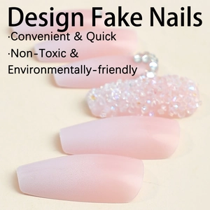 Long coffin gradient pink fake nails with sparkling rhinestones and French style design