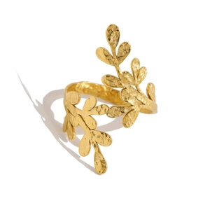 Detail of 18K gold-plated leafy branch ring with textured hammered metal finish