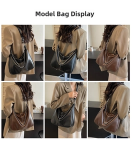 Detail view of large matte leather hobo bag with silver chain and contrast stitching
