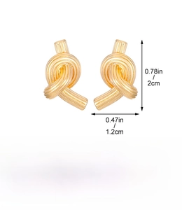Detailed view of gold knot earrings showing 2cm x 1.2cm size and 10.6g alloy weight