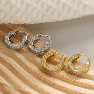 Exquisite gold and silver plated geometric hoop earrings with paved cubic zirconia stones