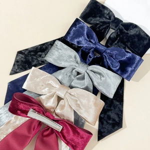 Vintage velvet bow hair clips in five colors including burgundy and black