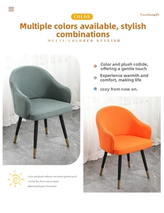 Detail view of waffle-textured elastic dining chair covers in grey-green and orange colors