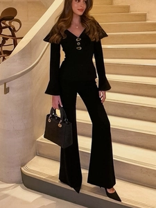 Elegant black commute set with golden buttons on long sleeve top and wide leg trousers