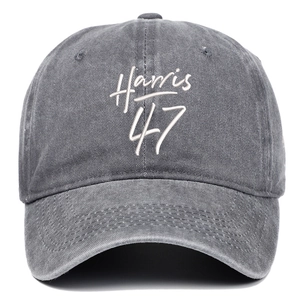 Detailed close-up of Harris 47 embroidery on a vintage washed grey cotton baseball cap