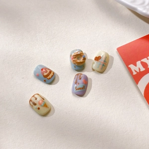Macaron color 3D nail art charms featuring sweet donuts and ice cream designs