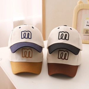 Minimalist kids cotton baseball caps with letter m embroidery in four colorways
