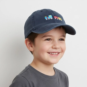Navy blue cotton kids baseball cap with colorful train embroidery worn by child