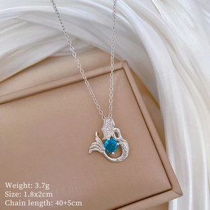 Detail view of mermaid sapphire pendant with 3.7g weight and 40+5cm chain specs
