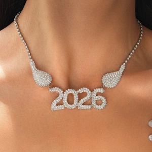 Close-up of 2026 rhinestone pendant necklace with water drop charms worn by a model