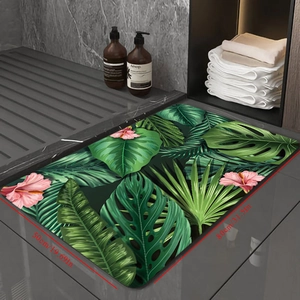 Detail view of 50x80cm tropical leaf bath mat showing size dimensions in a bathroom setting