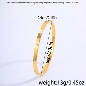 Detailed view of gold titanium heart bracelet with size 6cm diameter and 0.4cm width
