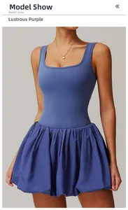 Detail of glazed purple athletic dress featuring U-neck sleeveless cut and pleated skirt