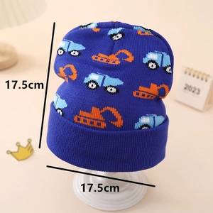 Flat lay of baby winter knit hat with excavator pattern showing 17.5cm dimensions