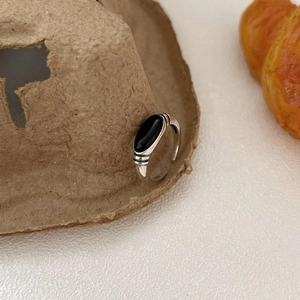 925 sterling silver ring with oval black onyx gemstone in a vintage minimalist design