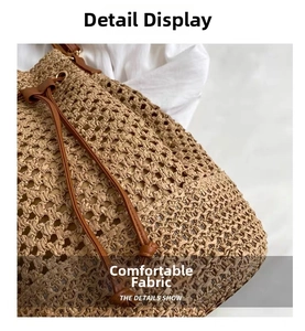 Detail show of woven straw bucket bag with leather drawstring and metal eyelets