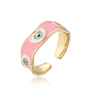 Detailed view of pink enamel heart evil eye pattern on adjustable 18K gold ring