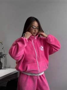 Ensemble de sport deux pièces en polaire magenta pour femme avec zip blanc et cordon