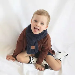 Kids warm dark blue chunky knit scarf for winter with cozy soft texture for boys and girls