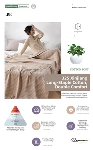 Close-up of beige waffle weave cotton blanket showing 32S Xinjiang long-staple cotton texture