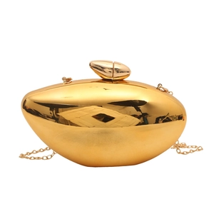 Chic gold mango shaped acrylic clutch bag with luxury metallic finish and chain strap