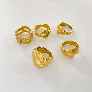 Set of 5 18K gold plated stainless steel rings with fluid lava and abstract texture designs