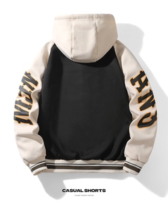 Detail of color-block fleece hoodie with letter embroidery on sleeves and ribbed cuffs