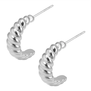 Macro shot of silver 304 stainless steel twisted hoop earrings in croissant style