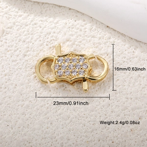 Detail of gold-plated pendant connector with cubic zirconia and size dimensions
