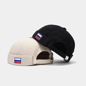 Black and beige cotton docker hats with Russian flag patch and metal buckle adjustment