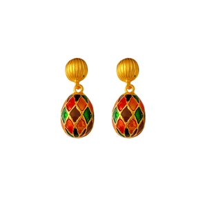 Vintage gold oval earrings with colorful enamel diamond pattern on white background