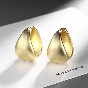 Minimalist matte gold teardrop hoop earrings with high-quality brushed metal texture