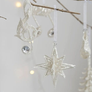 Silver glitter Christmas ornaments set featuring a treble clef and star with white ribbons
