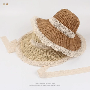 Detailed straw hat texture with lace bow and ribbon ties in brown and beige colors