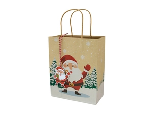 Detail of Christmas kraft paper gift bag featuring Santa Claus print and festive red-white cord