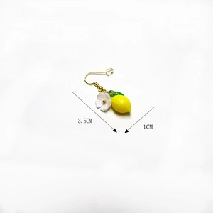 Detailed view of yellow lemon flower earrings with dimensions 3.5cm length and 1cm width