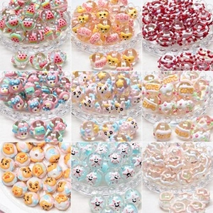 Macro grid of various colorful acrylic cartoon beads for DIY handmade jewelry crafts